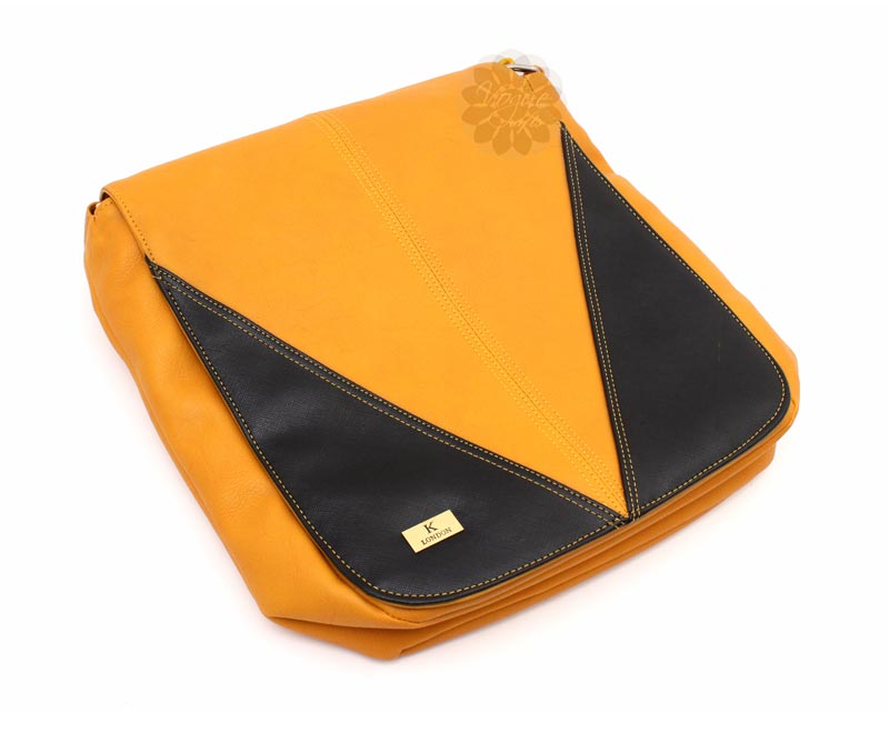 Vogue Crafts & Designs Pvt. Ltd. manufactures Modish Yellow Sling Bag at wholesale price.